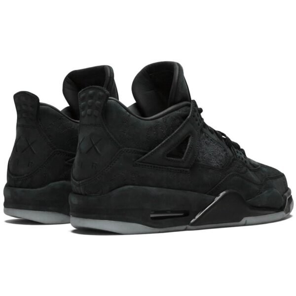 KAWS x Air Jordan 4 Retro 'Black' - Image 3